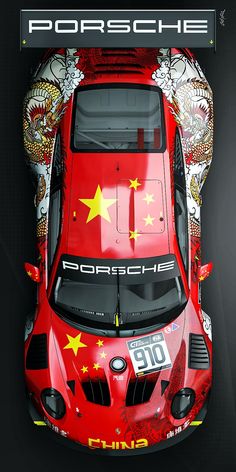 the top view of a red sports car with chinese writing on it's side