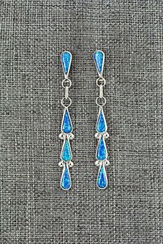 These opalite and sterling silver earrings were made by Zuni silversmith Angela Gasper. The back of one earring is signed A Gasper. Length: 2" Width: 1/4" Free shipping on all orders! We ship with USPS and always include tracking. All orders ship within a day of payment. Returns are accepted up to 30 days after you receive your order. Just send us a message. Our shop offers cash back or store credit. The item must be returned in new condition. One Earring, Bear Carving, Dainty Earrings, Pearl Chain, Native American Jewelry, Free Jewelry, Sterling Silver Earrings, Favorite Jewelry, Silver Earrings