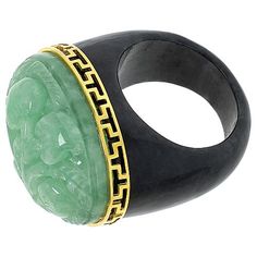 Elevate your ensemble with the Kwan Collections Gold-Plated Floral Carved Jade Ring. This exquisite piece showcases a masterful blend of artistry and elegance, perfect for those who appreciate unique jewelry.

- Size: 7
- Color: Gold
- Material: Yellow gold-plated sterling silver
- Gender: Female
- Features an oval-shaped green jade, intricately carved with a floral design, set atop a charcoal jade base
- Dimensions of the ring top: Approx. 3/4"L x 1"W x 9/16"H; Shank width: 5/16"W
- Design deta Luxury Green Jewelry With Polished Finish, Elegant Ceremonial Gemstone Rings, Elegant Ceremonial Rings With Gemstone, Luxury Oval Collectible Rings, Collectible Art Deco Carved Jewelry, Art Deco Carved Collectible Jewelry, Luxury Carved Jewelry For Formal Occasions, Luxury Green Collectible Jewelry, Fine Jewelry Carved Ring