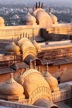 the roof of an old building with many domes and minalis on it's sides