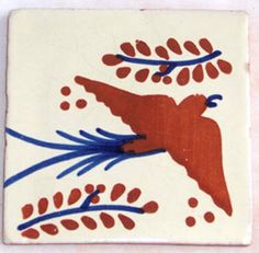 a tile with an image of a bird on it