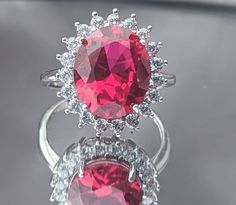 "Stones were examined by a certafied gemologist. 14k option comes with an appraisal letter. Choose from sterling silver with zircon or 14k white gold with natural diamond or moissanite.  You will feel like celebrity when wearing this large stunning 5ct Ruby ring. You will want to show it off to all of your friends. Step into the spotlight with our \"Celebrity-Inspired Luxe Ruby Ring,\" a stunning replica of the elegant piece worn by Eva Longoria. This exquisite ring is designed to make you feel like a star, turning heads and capturing hearts with its deep red sparkle. High quality, Clear And Flawless. Set in 4 prong setting to allow light behind the gem for amazing sparkle and light reflection.  Crafted with a lustrous sterling silver band and adorned with a captivating ruby, this ring isn 5ct Engagement Ring, Real Ruby Rings, Large Diamond Rings, Blood Red Color, Blood Ruby, Rubin Ring, Dainty Diamond Ring, Engagement Ring Halo, Real Diamond Rings