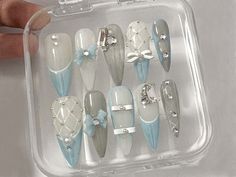 💙💅 Long Almond Press On Nails | Stunning Blue Nail Set | 3D Design With Bow and Pearl | Kawaii Nails | Fake Nails For Wedding, Birthday 💅✨ Indulge in the beauty of our Long Almond Press On Nails - a stunning blue nail set designed to captivate hearts with its elegant 3D design, featuring charming bows and pearls. These Kawaii-inspired nails add a touch of sophistication to any occasion, making them the perfect choice for weddings, birthdays, and beyond. ✨ Key Features: Long Almond Elegance: Embrace the allure of long almond-shaped nails, providing a perfect balance of sophistication and trendiness. The elongated shape enhances the overall elegance of your fingertips. Stunning Blue Hues: Immerse yourself in the stunning shades of blue that evoke a sense of calm and serenity. The vibrant Blue 3d Nails, Ongles Baby Blue, Nails Design Blue, Nail Inspo Blue, Chanel Nails Design, Bows And Pearls, Nails For Wedding, Almond Press On Nails, Long Almond