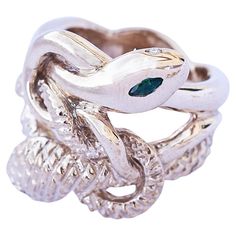 Animal Jewelry Emerald Marquis White Diamond Ruby Snake Ring Cocktail Ring Bronze J Dauphin Style: Cocktail Ring Material: Polished Bronze Designer: J Dauphin J DAUPHIN "Eternal Renewal" J Dauphin jewelry is hand made in Los Angeles and was created by designer Johanna Dauphin. Most of the jewelry is unique or created in small series. Every gem is individually selected by hand. She started her career working for the Italian luxury brand Fendi, now owned by the Louis Vuitton Group LVMH. J Dauphin Lykke Li, Chloë Sevigny, Sapphire Cocktail Ring, Chloe Sevigny, Uma Thurman, Snake Jewelry, Gold Cocktail, Diamond Cocktail Rings, Keith Richards