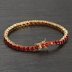 Brand New Women's Gold Ruby Tennis Bracelet Available In 7" & 8" Sizes (7" Is The Most Common Women's Size) Width 4mm 14k Gold Plated Sterling Silver Genuine 2ct Natural Red Ruby Gemstones Retail Price $400 Buy With Confidence From A Top Rated Seller With A 99%+ Rating! A1184 (Id-651) Red Luxury Tennis Bracelet For Formal Occasions, Classic Ruby Gemstone Tennis Bracelet, Red Round Tennis Bracelet For Formal Occasions, Gold Ruby Tennis Bracelet For Anniversary, Luxury Red Diamond Bracelet For Anniversary, Anniversary Gold Ruby Tennis Bracelet, Luxury Red Tennis Bracelet For Anniversary, Luxury Red Diamond Jubilee Bracelet, Elegant Red Tennis Bracelet