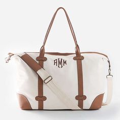 This vintage style weekender is ready to tag along with you for all your trips! Perfect for any woman on the go, this beautiful weekend bag features antique gold hardware. Add a monogram and pair it with a monogrammed tote bag, monogrammed cosmetic bag or any other piece from our Vintage Travel Collection for a great gift that any bride, college student or globe trotter will love.Zipper top closure Body made of durable cotton canvas with a faux leather trim and a tan brushed polyester liningFeat Monogram Canvas Tote Travel Bag, Rectangular Monogram Canvas Duffle Bag For Everyday, Classic Monogram Canvas Duffle Bag, Monogram Canvas Satchel Tote For Travel, Brown Rectangular Travel Bag For Weekend, Travel Satchel In Monogram Canvas With Large Capacity, White Weekender Bag With Handles For Travel, Travel Satchel With Large Capacity In Monogram Canvas, White Monogram Canvas Bag With Leather Trim