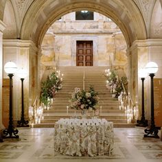 a table is set up in the middle of a hall