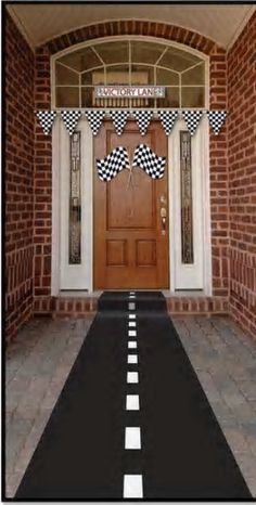 a black and white checkered flag is on the front door