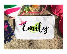 a white bag with the word'family'printed on it sitting in the sand