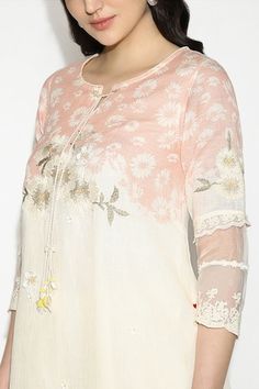 Off white and blush pink tunic with hand embroidery of anchor and silk threads embossed on top of screen-printed daisy flowers, highlighted with 3d flowers, with handmade daisy tassels dangling over the neck and sleeves. Paired with a pant with scallop embroidered lace. - Aza Fashions Spring Wedding Straight Kurta Top, Spring Pink Kurta With Embroidered Sleeves, Spring Straight Kurta With Tonal Embroidery, Spring Festive Kurta With Tonal Embroidery, Summer Pink Kurta With Intricate Embroidery, Pink Tunic, Fly Free, Daisy Flowers, 3d Flowers