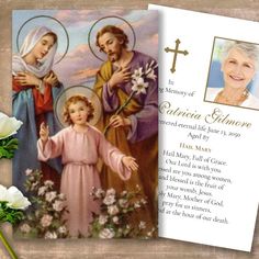 an image of the mother of jesus and her children with flowers in front of it