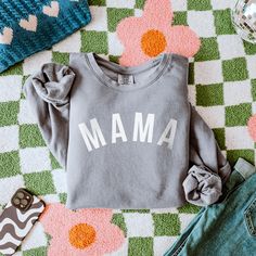 She's Baaaaaack! Our Modern Mama tee, hoodie or crewneck now has a permanent place in the shop! This is the PERFECT design for gifting, an easy basic for travel, or the perfect crewneck to throw on and head out! Annnnd include the entire family! This modern style is available for dad, mini, or big/little bro or sis! Perfect for ANY family! We're thinking year family pics, baby announcements, or just a cute matching moment! DETAILS Unisex sizing - aka mens sizing. This fits a little more relaxed than our regular crewnecks and tees. 80/20 ring spun cotton/polyester, 3-end garment-dyed soft ring spun color blast fleece with a 100% cotton face Relaxed fit with a rib collar, twill taped back neck, rolled forward shoulder & side seams Available on Black, Espresso, Ivory or Grey comfort colors te Cotton Hoodie With Screen Print Crew Neck, Unisex Cotton Sweatshirt With Letter Print, Unisex Letter Print Cotton Sweatshirt, Cotton Graphic Tee Sweatshirt For Everyday, Comfortable Cotton Sweatshirt With Screen Print, Comfort Gray, Mama Tee, Cute Matching, Baby Announcements