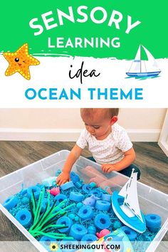 a child playing with ocean themed toys in a plastic container that says, seastory learning idea