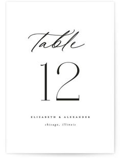 the black and white wedding table number card is shown in front of a white background