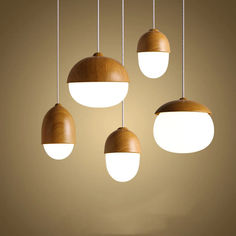 five wooden lights hanging from the ceiling