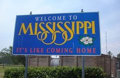 a welcome sign to mississippi it's like coming home