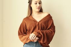 DESCRIPTION:  This 80's blouse is perfect with high waisted pants or a nice suit. Lightweight and versatile.  COLOR: Brown SIZE: 15/16 *Keep in mind that vintage sizes may vary from present sizes. See measurements below* MEASUREMENTS: Length: 28 inches Bust: 44 inches Collar: 20 inches Sleeve length: 23 inches CONDITION: Great Please allow 3-7 business days for delivery. Vintage clothing can contain wear such as holes and stains. If you have any concerns about the condition please feel free to c Cheap Brown Cotton Blouse, Vintage V-neck Tops For Workwear, Retro V-neck Top For Workwear, Retro V-neck Blouse For Fall, Retro Oversized V-neck Tops, Oversized Collared Vintage Blouse, Brown Blouse, Just My Size, Womens Blouses