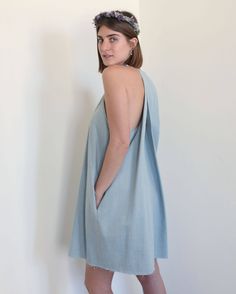 "Denim Dress, Summer Dress, Bridesmaid Dress Beautifully designed and masterly sewn- This Origami dream is by far my favorite all time piece i ever created!! Creating this pattern I was thinking, first of all, about comfort and sophistication mixed together. Very Inspired from Japanese origami I constructed this silhouette in a form of sculpture, maintaining it in the back while the front is super minimalistic, and features a side neck tie that can be fastened to your desired fit. As for the fab White Kimono Dress, Dress Origami, Dress Extravagant, Denim Dress Summer, Dress Minimal, Minimal Dress, Origami Dress, Dress Geometric, Japanese Origami