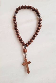 Wooden Christian 33 knot Prayer Rope / Car Pendant / Prayer Beads / komboloi 33 Wooden small Beads 1 Wooden big Bead Wooden Cross Jesus Christ crucifixion 4 Metalic Silver Beads with engraved Cross Elastic Cord Blessed on the lerics of Saints and Holy cross For bless, protection and prayer With myrrh/ anointing oil Prayer with rosary, which is very helpful in concentrating the mind and pray with says following greetings: Lord Jesus Christ have mercy on me Anointing Oil Prayer, Jesus Christ Crucifixion, Christ Crucifixion, Anointing Oil, Blessed Mary, Engraved Cross, Cross Jesus, Jesus Christus, Small Beads