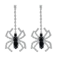 PRICES MAY VARY. Halloween Spider Earrings: This Halloween earring incorporates Rhinestone and spider Halloween elements into the design of women's earrings, which is novel, unique, simple, and exquisite. Suitable occasions for spider earrings: These Halloween spider earrings are excellent accessories for your Halloween party themes, role-playing parties, and daily travel costumes. We believe they can make you look different, more confident, more beautiful, and cooler! Halloween Spider Earrings Size: This earring is 3.1 inches long and 1.2 inches wide. Halloween Spider Advantage: This Halloween spider earring is durable, lightweight, and will not burden the ears. MEMFALL Jewelry: We always make every effort to provide every customer with the best jewelry and service. If you have any questi Spooky Silver Party Jewelry, Novelty Black Earrings For Party, Gothic Sterling Silver Earrings For Parties, Novelty Black Party Earrings, Novelty Drop Earrings For Party, Halloween Party Silver Earrings, Silver Halloween Party Earrings, Silver Earrings For Halloween Party, Sterling Silver Jewelry For Halloween Party