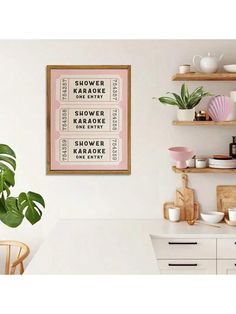 a kitchen with shelves filled with dishes and plants