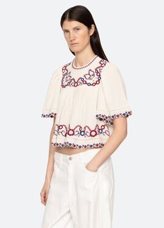 The Soren embroidered short sleeve cropped top features short bell sleeves and embroidered detailing. Designed for an easy, relaxed fit. Details: self-100% cotton combo-100% cotton button back fastening designed for a relaxed fit style #PF24-069 model is 5'10'' and wearing a size S Short Bell Sleeves, Fit Details, Embroidered Shorts, Short Sleeve Cropped Top, Kids Sleepwear, Fit Style, Cropped Top, Mommy And Me, Aesthetic Clothes