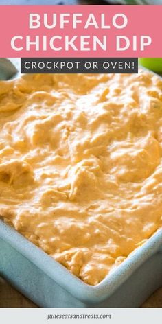 buffalo chicken dip in a blue casserole dish with text overlay that reads buffalo chicken dip crockpot or oven