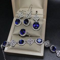 Welcome to Elegant Art Jewelry!  Stone: Natural Tanzanite Material: 925 Sterling Silver Stone Size: ( Earrings and Bracelet: 6mm×8mm ), ( Ring: 7mmx9mm), ( Pendant: 8mmx10mm ) Gemstone Cut: Oval Cut Side Stone: Zircon Personalization: 9K/14K/24K/GOLD/SILVER/PLATINUM/ROSE-GOLD/WHITE GOLD. (Contact me)  Natural Tanzanite Ring, Tanzanite Cuff Ring, 925 Sterling Silver Ring, Round Shape Ring, Tanzanite Ring, Tanzanite Engagement, Open Design Ring, Tanzanite Oval, Tanzanite Natural, Blue Tanzanite , Necklace Luxury, Tanzanite Necklace, Tanzanite Jewelry, Platinum Rose Gold, Women Pendant, Victorian Rings, Emerald Pendant, Elegant Art, Natural Tanzanite