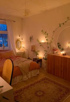 a bed room with a neatly made bed next to a large window and a rug