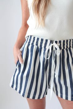 Stripe Twill Denim Shorts Spring Vacation Bottoms With Vertical Stripes, Casual Bottoms With Vertical Stripes For Day Out, Vacation Shorts With Elastic Paperbag Waist, Vacation Paperbag Waist Shorts With Elastic Waistband, Vacation Paperbag Waist Shorts With Elastic Band, Paperbag Waist Bottoms For Summer Loungewear, Summer Loungewear Bottoms With Paperbag Waist, Cotton Tie Waist Bottoms For Vacation, Vacation Cotton Bottoms With Tie Waist