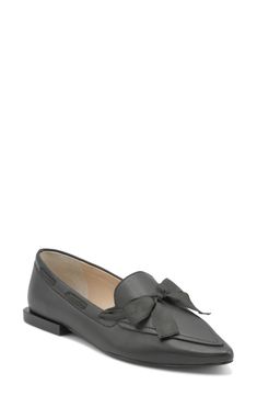 An oversized bow highlights the pointy toe of this versatile flat detailed with boat shoe-inspired lacing and furnished with a cushioned footbed. Leather upper/synthetic lining and sole Imported Leather Flat Loafers With Bow, Leather Flats With Bow For Work, Flat Leather Loafers With Bow, Leather Bow Flats For Work, Leather Bow Flats For Office, Leather Loafers With Bow And Flat Heel, Leather Bow Loafers With Round Toe, Casual Flats With Bow And Pointed Toe, Leather Flats With Bow For Fall