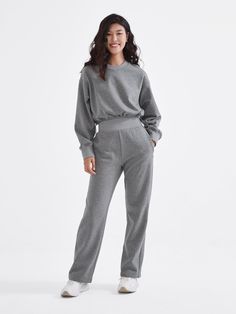 The must have collection this winter. Constructed, stylish, perfect, premium comfort. Sporting a 360 degree elastic waistband, our Cubby Sweatpants is made from a unique soft premium fabric. Hidden functional pockets lined with supersoft fuzz (plus a secret extra side pocket with an invisible zipper). It's high waisted elastic cut also works to tuck in the belly and elongate your body shape ☺  Models are 5'7. Jean Size 24/25. Hips under 34.5" wearing size 1-Regular. Petite Models are 5'0. Jean S Winter Full-length Pants With Ribbed Waistband, Elevated Casual Full-length Bottoms With Side Pockets, Elevated Casual Full-length Sweatpants With Elastic Waistband, Full Length Sweatpants For Elevated Casual Look, Elevated Casual Full-length Pants For Fall, Full-length Sweatpants With Ribbed Cuffs For Fall, Full Length Sweatpants With Ribbed Cuffs For Fall, Winter Stretch Wide Leg Pants With Elastic Waistband, Winter Wide Leg Stretch Pants With Elastic Waistband