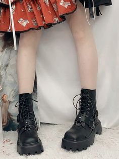 The length of the boots does not include heels.   	 		 			Size 			34 			35 			36 			37 			38 			39 			40 		 		 			Foot Length 			22 			22.5 			23 			23.5 			24 			24.5 			25 		 		 			Heel 			5 			5 			5 			5 			5 			5 			5 		 		 			Length 			15 			15 			15 			15 			15 			15 			15 Gothic Boots For Fall, Grunge Boots With Round Toe, High Ankle Punk Martin Boots, Gothic Moto Boots With Round Toe, Gothic Boots With Buckle Closure And Round Toe, Edgy Lace-up Boots With Buckle Closure, Gothic Lace-up Platform Boots, Gothic Lace-up Boots With Buckle Closure, Chinese Style Shoes