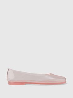 These flats are made with a translucent jelly plastic upper.  Rubber gripper sole.  For more fit and sizing info, check out our Size Guide. Pink Flat Jelly Sandals, Pink Flat Plastic Jelly Sandals, Clear Plastic Jelly Sandals For Spring, Spring Clear Plastic Jelly Sandals, Casual Flat Plastic Jelly Sandals, Trendy Jelly Sandals With Translucent Outsole, Non-slip Flat Jelly Sandals, Clear Plastic Jelly Sandals With Round Toe, Casual Clear Flat Jelly Sandals