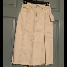 This Is A Versatile Denim Skirt That Can Be Worn Casual Or To Work. Length Starting At Waist 27”. Frayed Edge. Color Is Off White Almost A Light Cream Color. This Listing Includes Free Shipping. A Lower Offer Will Not Include Free Shipping. Casual White Denim Skirt For Fall, White Denim Skirt With Frayed Hem For Spring, White Frayed Hem Skirt For Spring, High Rise Lined Skirt For Spring, White Skirt With Frayed Hem For Spring, White Mid-rise Skirt For Spring, White High-rise Skirt For Spring, High-rise White Skirt With Frayed Hem, High Rise White Skirt With Frayed Hem