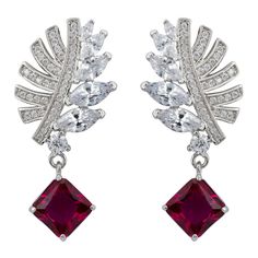 Inspired by Mother Nature, the delicate leaf motif is adorned with sparkling zircons. One side is graced with pave-set zircons, while the other side shines with marquis-cut stones, creating a striking balance of sparkle and sophistication. Suspended beneath this elegant leaf is a mesmerizing square-cut lab-grown Ruby, attached by a corner to create a distinctive diamond shape. Known for its rich, red hue, Ruby is the birthstone for July. This enchanting gemstone symbolizes passion, protection, a Red Diamond Earrings With Accents For Wedding, Red Cubic Zirconia Earrings With Diamond Accents, Cubic Zirconia Bridal Earrings With Pave Setting For Evening, Elegant Red Cubic Zirconia Bridal Earrings, Elegant Silver Ruby Diamond Earrings, Ruby Drop Earrings, Drop Earrings Silver, August Birthstone Jewelry, July Birthstone Jewelry