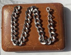 Metal is 750 silver (lower silver content) marked Length of chain: 10.25 Width of chain: 9.61mm Height of swivel clasp: 0.72 inch screws opens and closed well, swivels Total length of the chain: 10.92 inch  Weight: 22.75 grams Clasp works well, works great as a charm holder, and screws down to open. Chain Watch, Silver Link Chain, Charm Holder, Necklace Extender, Watch Bracelet, Choker Necklaces, Bracelet Necklace, Link Chain, Antique Vintage