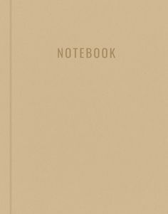 an open notebook with the word notebook written in white ink on top of beige paper