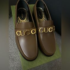 Brand New Men Gucci Loafers. Gucci Calf Leather Loafers With Rubber Sole, Brown Gucci Slip-on Loafers, Gucci Brown Shoes With Leather Sole, Luxury Brown Gucci Loafers, Gucci Luxury Calf Leather Loafers, Luxury Gucci Calf Leather Loafers, Gucci Brown Loafers With Rubber Sole, Brown Gucci Loafers With Rubber Sole, Gucci Luxury Almond Toe Loafers