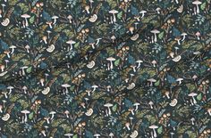 the fabric has mushrooms and leaves on it