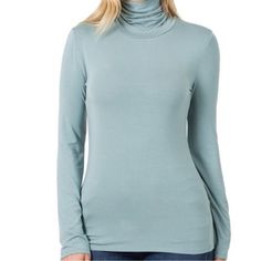 Blue Grey Fitted Mock Neck Long Sleeve Top. 95% Rayon 5% Spandex Spring Blue Turtleneck Top, Blue Turtleneck Top For Spring, Blue Turtleneck Tops For Layering, Blue Turtleneck Top For Fall, Light Blue Tops For Winter Layering, Casual Blue Turtleneck Top, Mock Neck Shirt, Mock Neck Long Sleeve, Neck Shirt