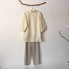 "Ready to wear cream linen blouses size M material: cream linen design: 3/4 sleeves chipao collar wavy hem measurements of the blouse : bust 40\" room (please allow extra room for your body measurements) blouse length 23\" front / 32\" back size M mix linen blouses are also available in the link below https://www.etsy.com/listing/714154694/ready-wear-mix-linen-blouses-size-m-wavy?ref=shop_home_active_9&frs=1" Beige Long Sleeve Flax Top, Beige Flax Long Sleeve Top, Summer Beige Ramie Blouse, Cream Linen Blouse For Spring, Cream Linen Long Sleeve Blouse, Cream Long Sleeve Linen Blouse, Long Sleeve Cream Linen Blouse, Spring Cream Linen Blouse, Linen Blouses