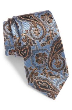 A classic paisley pattern brings smart, classic detailing to a tie crafted for versatility and distinction from polished silk jacquard. 100% silk Dry clean Imported Elegant Patterned Ties With Paisley Print, Formal Patterned Ties With Paisley Print, Elegant Semi-formal Ties With Paisley Print, Elegant Semi-formal Paisley Print Ties, Classic Paisley Print Patterned Ties, Tie Crafts, Paisley Pattern, Silk Ties, Paisley