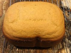 a loaf of bread sitting on top of a cooling rack