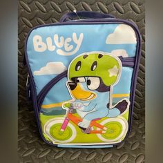 New With Tags Bbc Bluey Lunch Bag - Front Zip - Side Mesh Pockets - Zip Insulated Interior Main Compartment - 10” X 7.5” X 5” - Pet And Smoke Free Home Ride Along, Lunch Bag, Kids Accessories, Bbc, Goggles, Favorite Character, Blue Green, Bag Accessories, Kids Shop