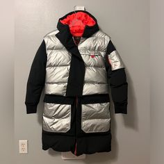 Nwot Women’s Puffer Nike Air Jordan Trench Coat Size Small/Standard Fit Has A Big, Deep Velcro Pocket On The Front And Two On The Bottom Of Each Side Also Has A Zipper Side Pocket On Left Sleeve Slit On Back As Shown Pit To Pit 22” Shoulder To Hem 38” Release Date Winter 2023 Retail Price $375 Colors Are Silver & Back With A Bright Coral Interior Coral Interior, Jordan Jackets, Womens Jordans, Winter 2023, Side Pocket, Release Date, Nike Air Jordan, Down Jacket, Air Jordan