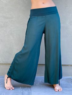 women's natural rayon lightweight loose fit adjustable teal blue side ruched pants with stretchy wide waistband #color_teal Versatile Stretch Viscose Pants, Green Wide Leg Viscose Bottoms, Bohemian Ruched Bottoms For Summer, Green Viscose Casual Bottoms, Casual Green Viscose Bottoms, Bohemian Ruched Bottoms For Spring, Spring Bohemian Ruched Bottoms, Casual Ruched Wide Leg Pants, Casual Wide Leg Ruched Pants