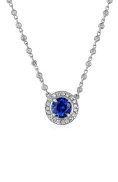 A diamond bezel chain trickles down to a brilliant sapphire pendant haloed in pavé diamonds and cast in 18-karat gold. 18" length Total sapphire weight: 2.12ct. Total diamond weight: 2.12ct. Color: G–H Clarity: VS 18k gold/diamond/sapphire Made in the USA >Diamond Guide Silver Sapphire Necklace With Single Cut Diamonds, Formal Sapphire Necklace With Single Cut Diamonds, Sapphire Pave Setting Jewelry, Sapphire Pendant With Single Cut Diamonds, Sapphire Jewelry With Pave Setting, Sapphire Necklace With Single Cut Diamonds, Sapphire Necklaces With Single Cut Diamonds, Sapphire Necklaces With Diamond Accents Pendant, Dazzling Sapphire Jewelry With Pave Setting