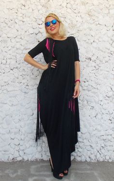 Women maxi dress with fuchsia inset and silk fringes. Very loose and playful kaftan, perfect both for parties and day wear. Great fabric, very soft viscose with a smooth feeling that easily gives that boho chic attitude. Material: 95% viscose, 5% elastane Care instructions: Wash at 30 degrees. The model in the picture is size S. Can be made in ALL SIZES. If you have any other specific requirements, do not hesitate to contact me! I DO NOT CHARGE EXTRA MONEY for custom made items. All you need to Festival Floor-length Maxi Dress With Tassels, Spring Maxi Dress With Fringe, Spring Maxi Kaftan With Tassels, Beach Maxi Dress With Tassels And Floor-length, Summer Floor-length Maxi Dress With Tassels, Floor-length Maxi Dress With Tassels For The Beach, Beach Floor-length Maxi Dress With Tassels, Fringe Floor-length Maxi Dress, Beach Floor-length Tassel Maxi Dress