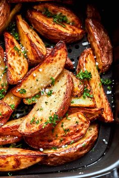 baked potato wedges with parsley in an air fryer